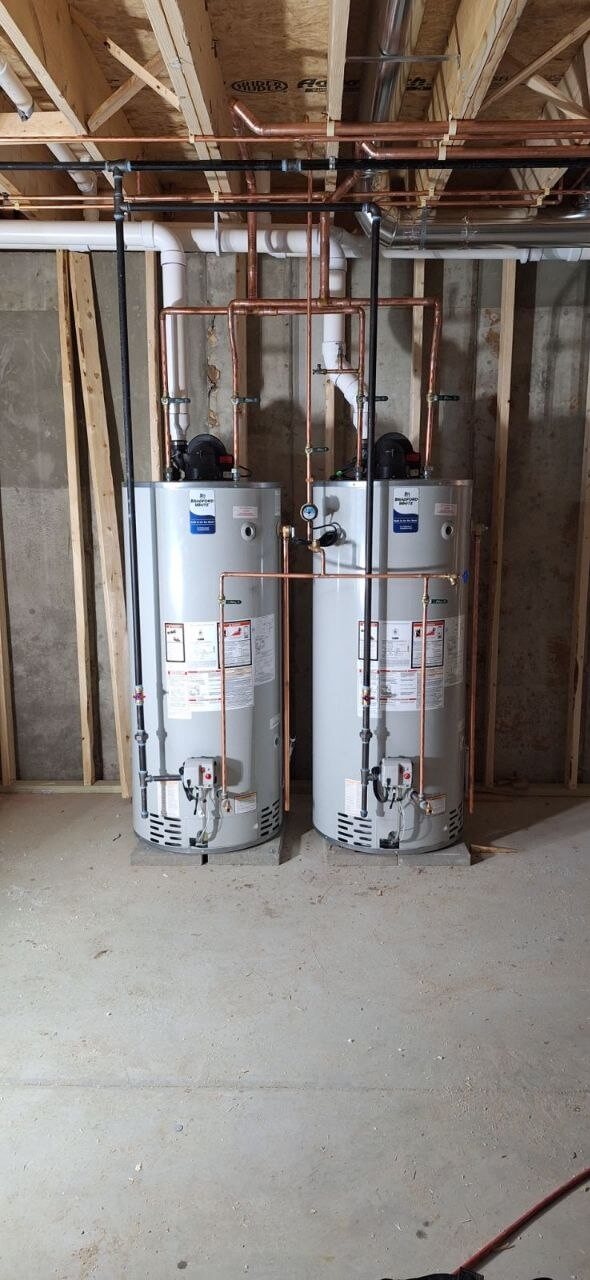 Water heater installation with copper venting in new construction