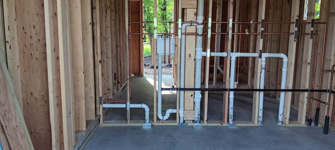 Piping installed along a commercial interior wall