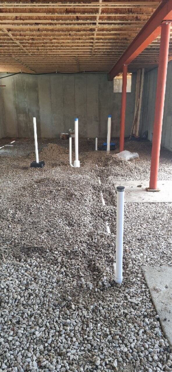 Underground plumbing rough-in with multiple vent stacks